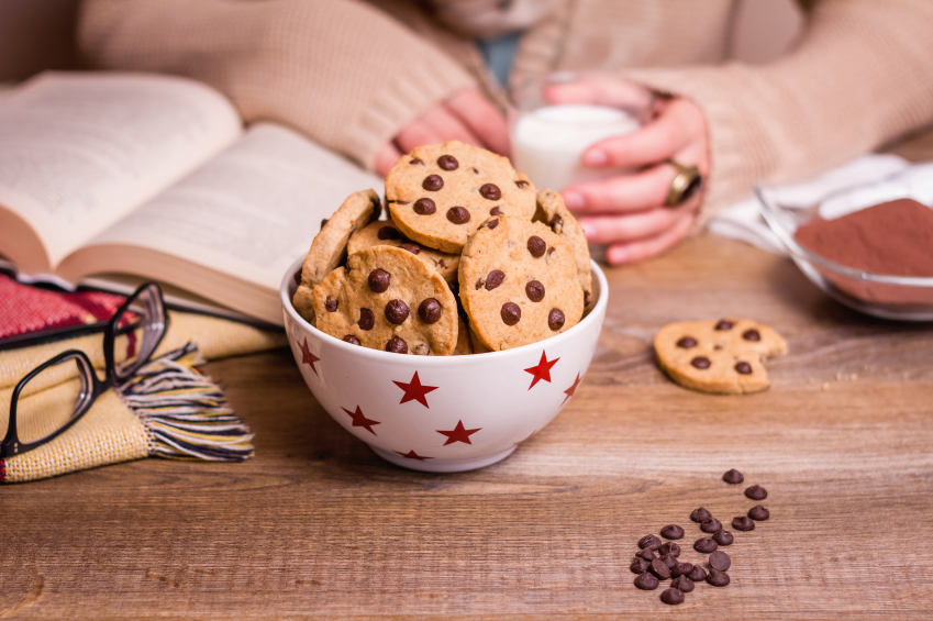 Chocolate chip cookies on stars bowl over a table