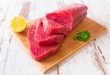 Raw tuna steak on wooden cutboard