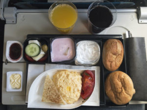 Airplane interior treat breakfast for economy service