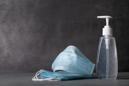 Sanitizer gel or antibacterial soap and face mask for coronavirus preventive measure