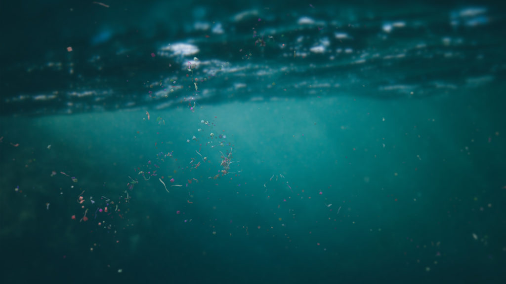 microplastics floating in ocean water, micro plastic pollution