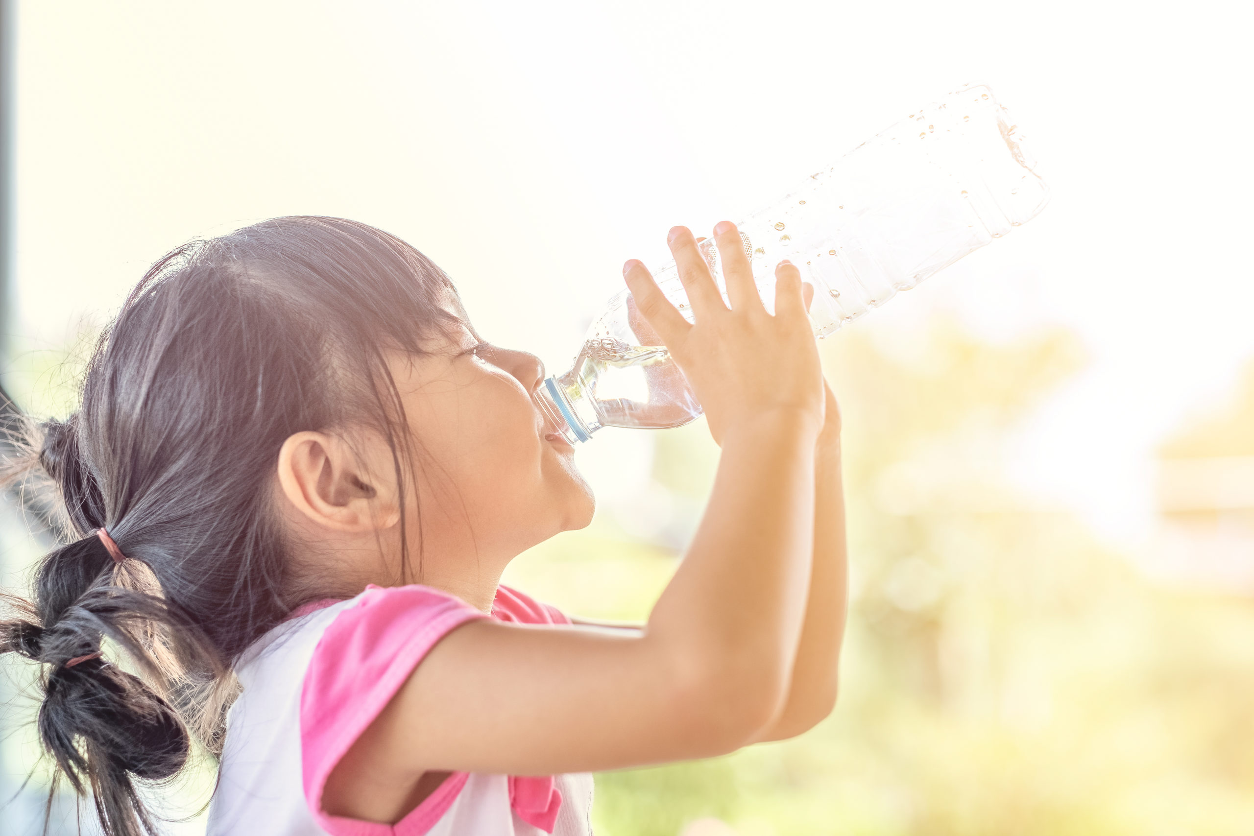 little girl drinking water