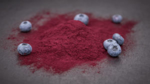 Some Blueberry Powder on a dark slate slab