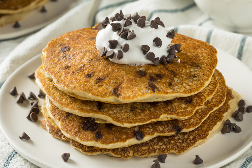 Pancake Olandese Del Bambino Con Le Bacche E La Crema in Una Pentola Della  Ghisa, Vista Superiore Immagine Stock - Immagine di buongustaio, crema:  137722819