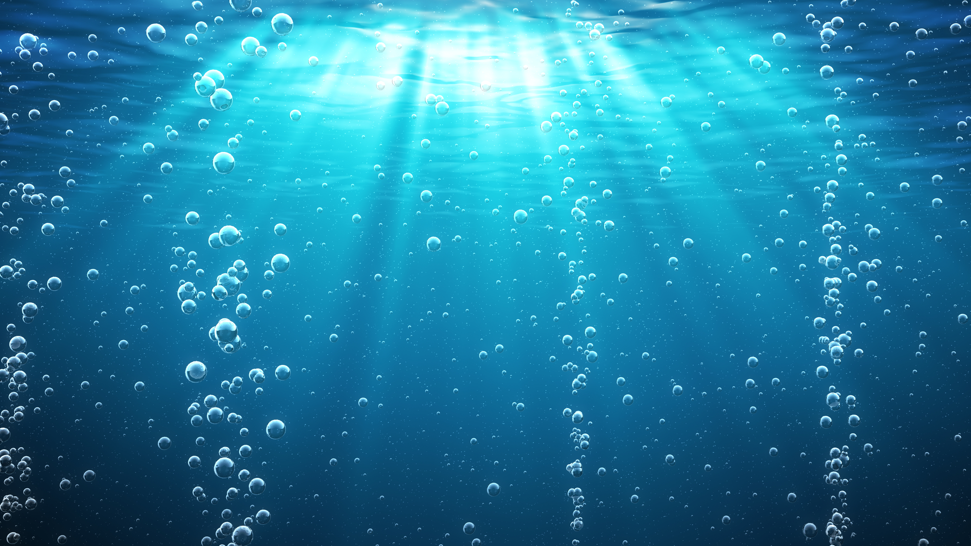 Bollicine di aria che salgono verso la superficie del mare, vista da sott'acqua